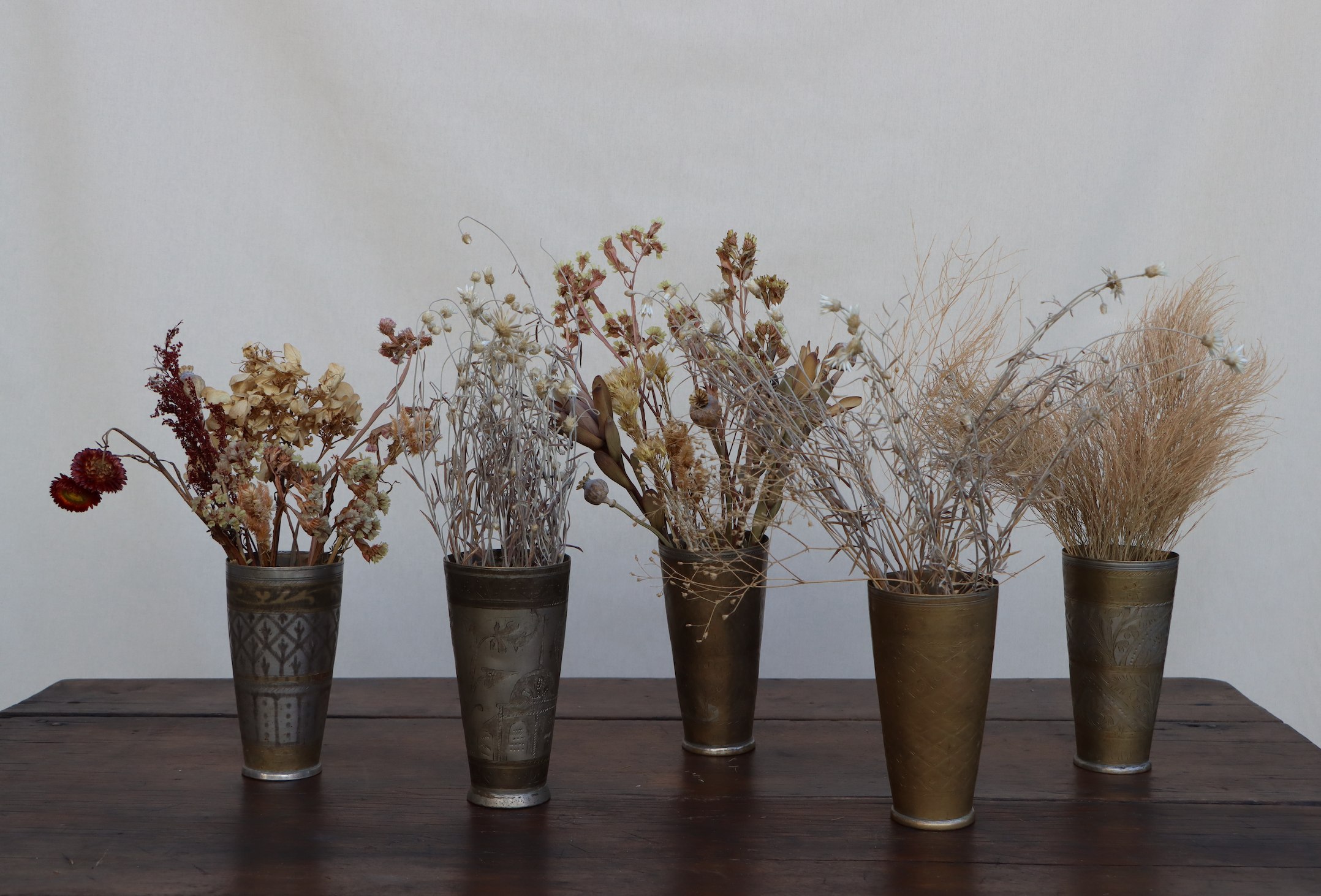 Curated dried flowers and vintage vessels from The Collective Shop