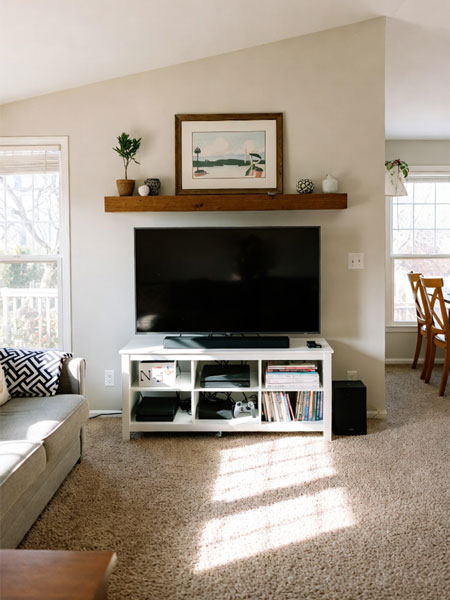 Visualiseur de meuble TV DecorViz montrant un meuble TV placé dans une vraie photo de pièce